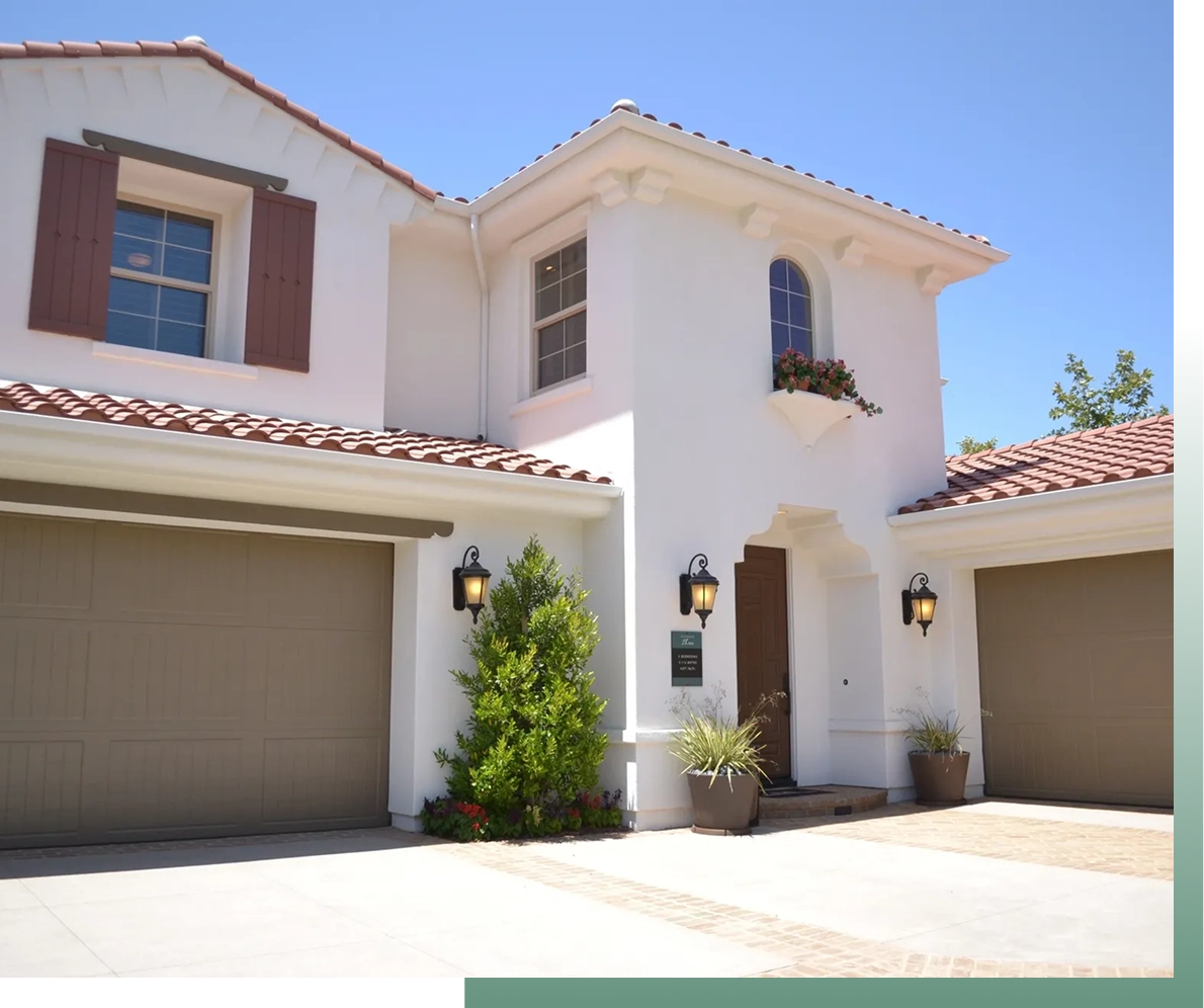 White stucco house with red roof