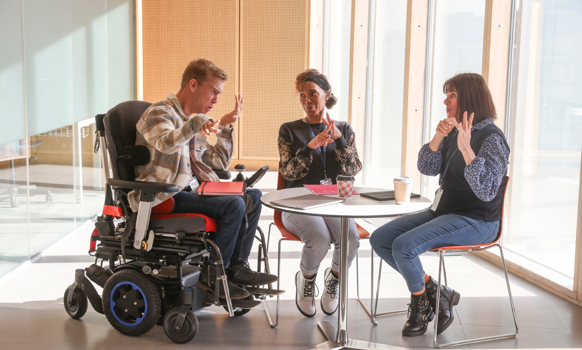 Group in discussion using sign language.