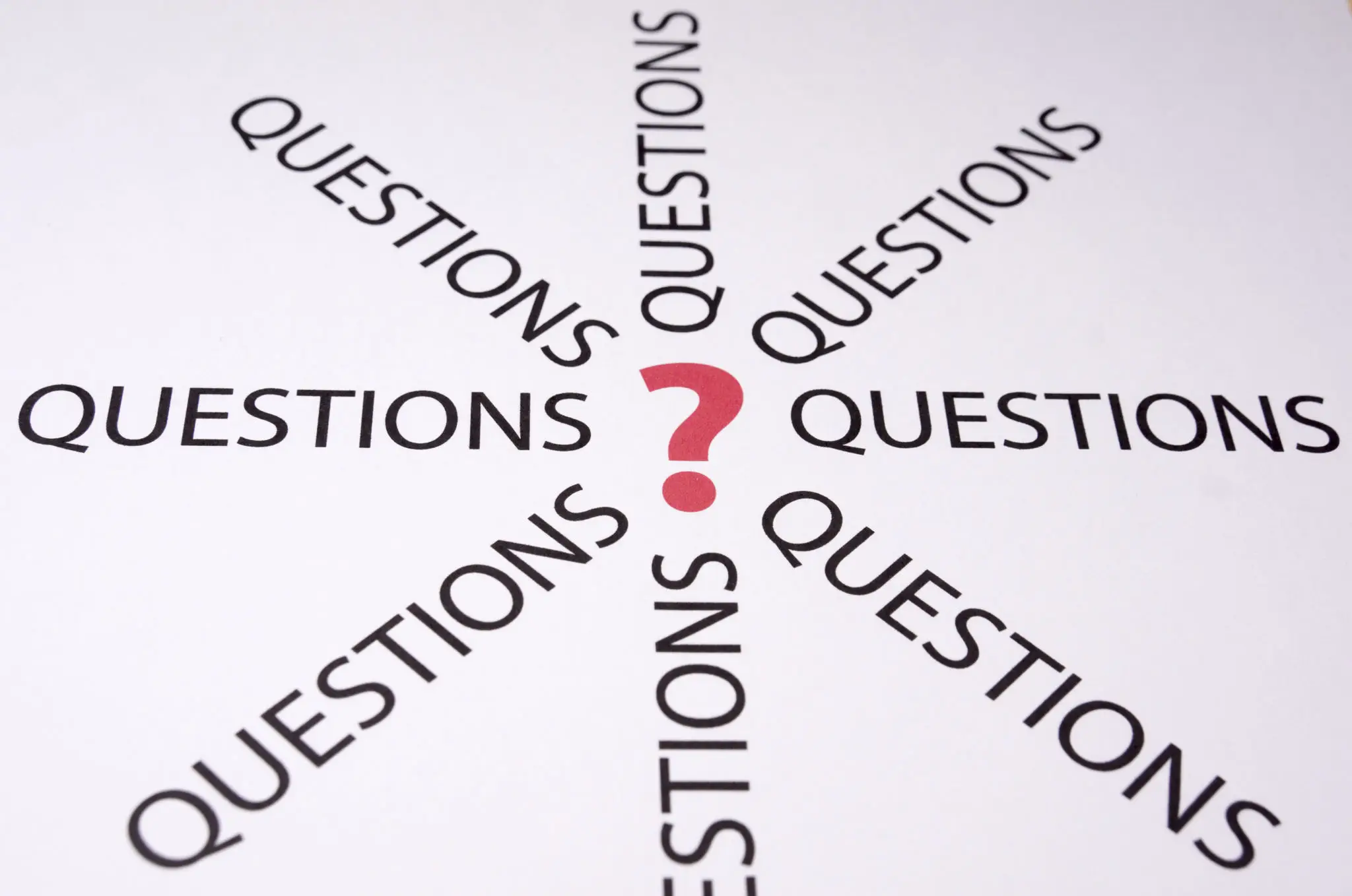 Red question mark surrounded by the word 'QUESTIONS' in black text.