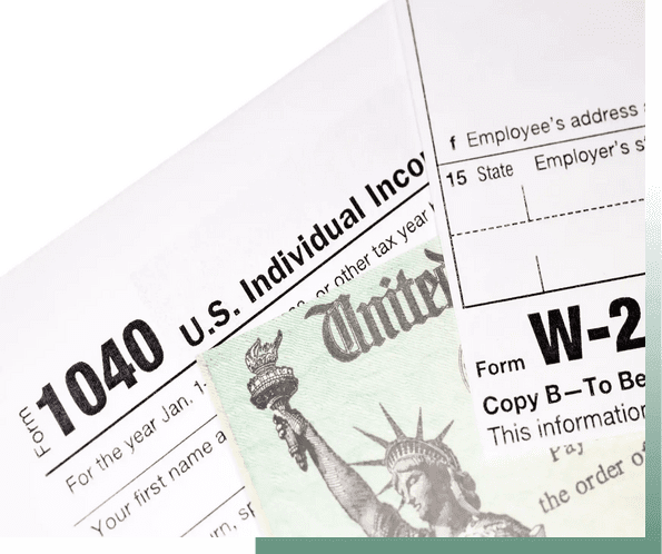 Close-up of a U.S. 1040 tax form with Statue of Liberty image.